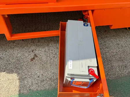 Batteries are stored in side compartments for easy removal and replacement.